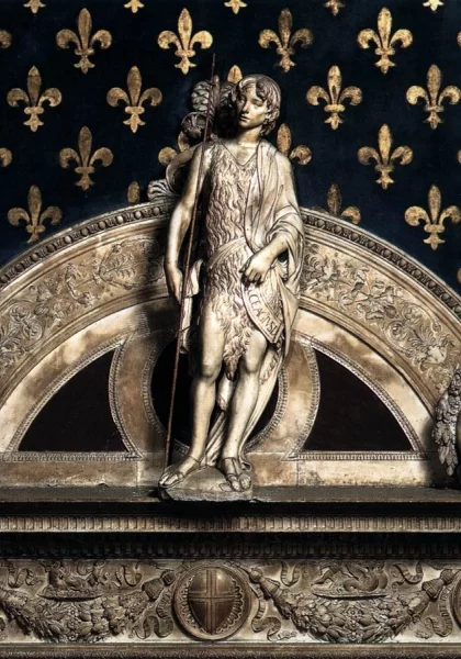 Šv. Jonas Krikštytojas Sala dei Gigli vakarinės sienos portalo trapecijoje. Benedetto da Maiano, 1470. Šv. Jonas Krikštytojas Sala dei Gigli vakarinės sienos portalo trapecijoje. Benedetto da Maiano, 1470.